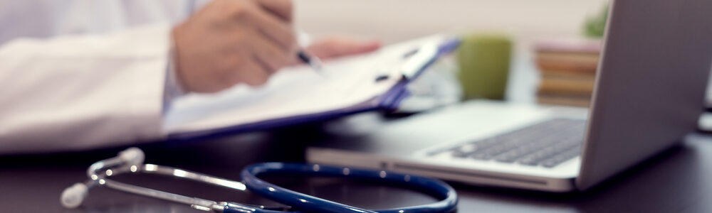 Stethoscope,With,Clipboard,And,Laptop,On,Desk,doctor,Working,In,Hospital